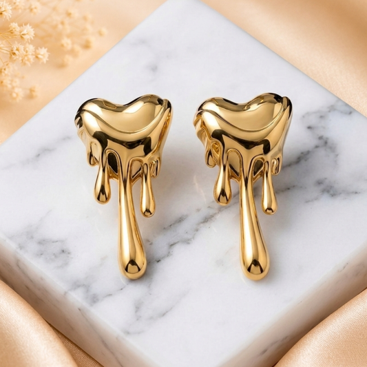 Aurelia Melt Luxe Drop Earrings by Zariva crafted from SS316L stainless steel with 18K Gold PVD finish, anti-tarnish molten gold earrings for women designed for parties, gifting and everyday luxury.