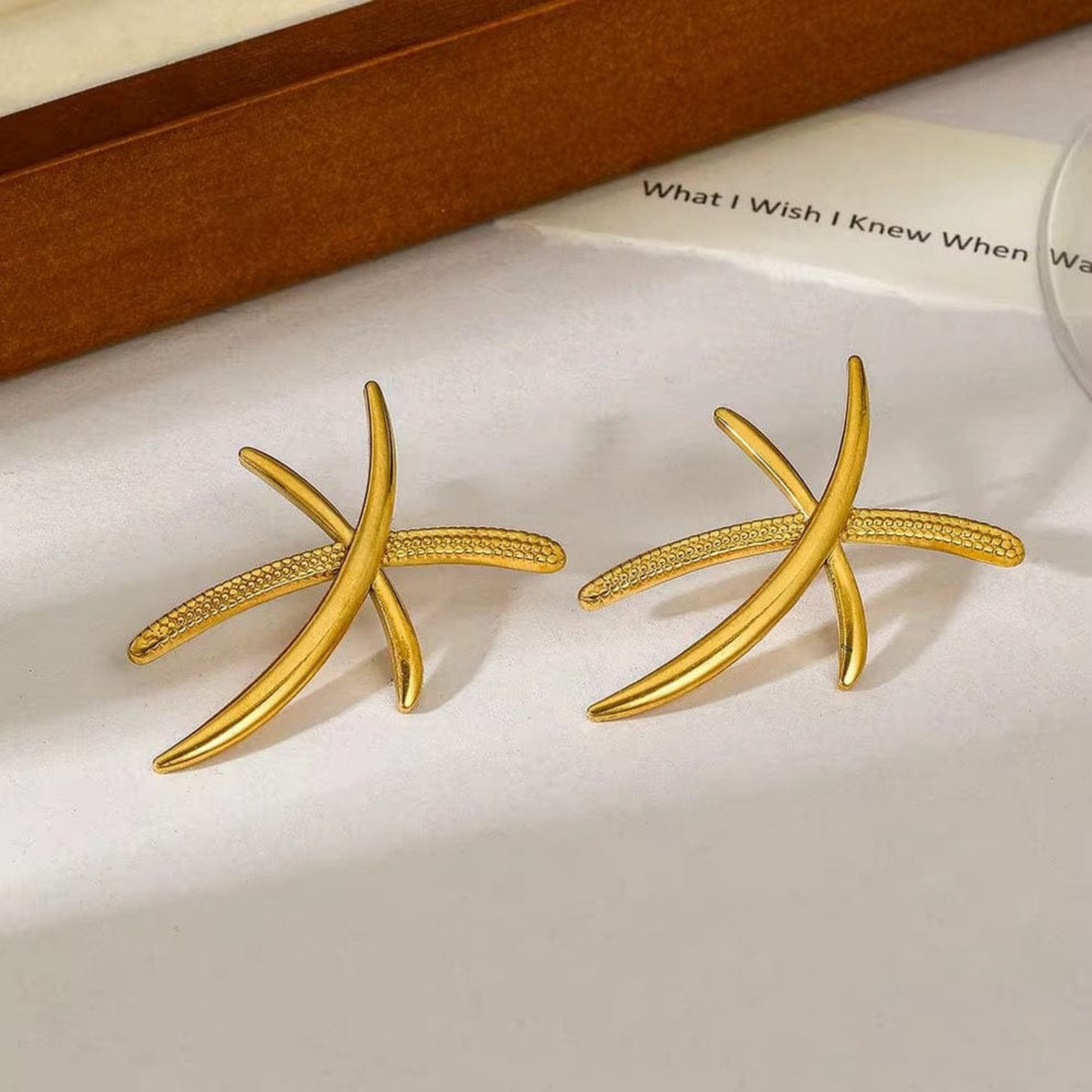 Aurex Crossline Golden Statement Earrings