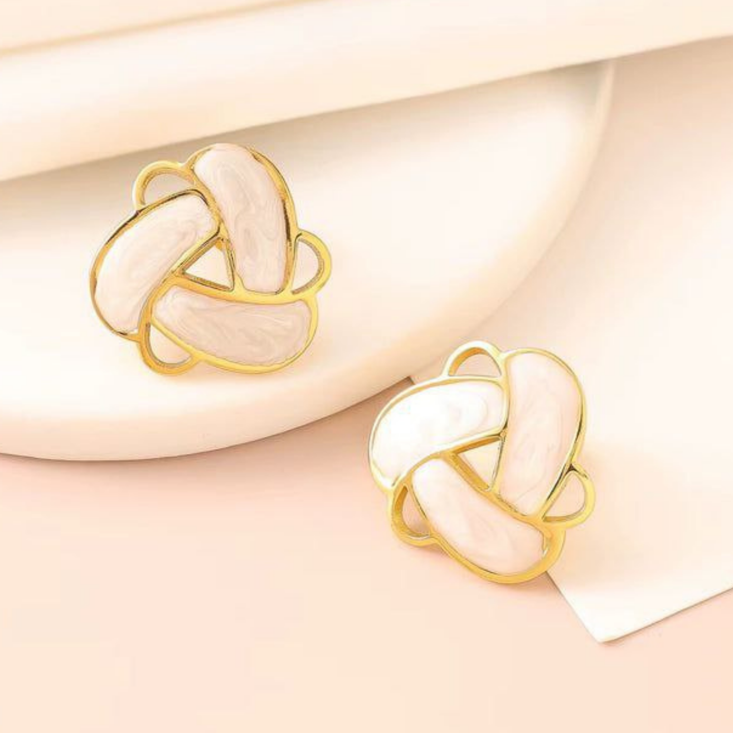 Elan Knot Gold Stud Earrings – Zariva