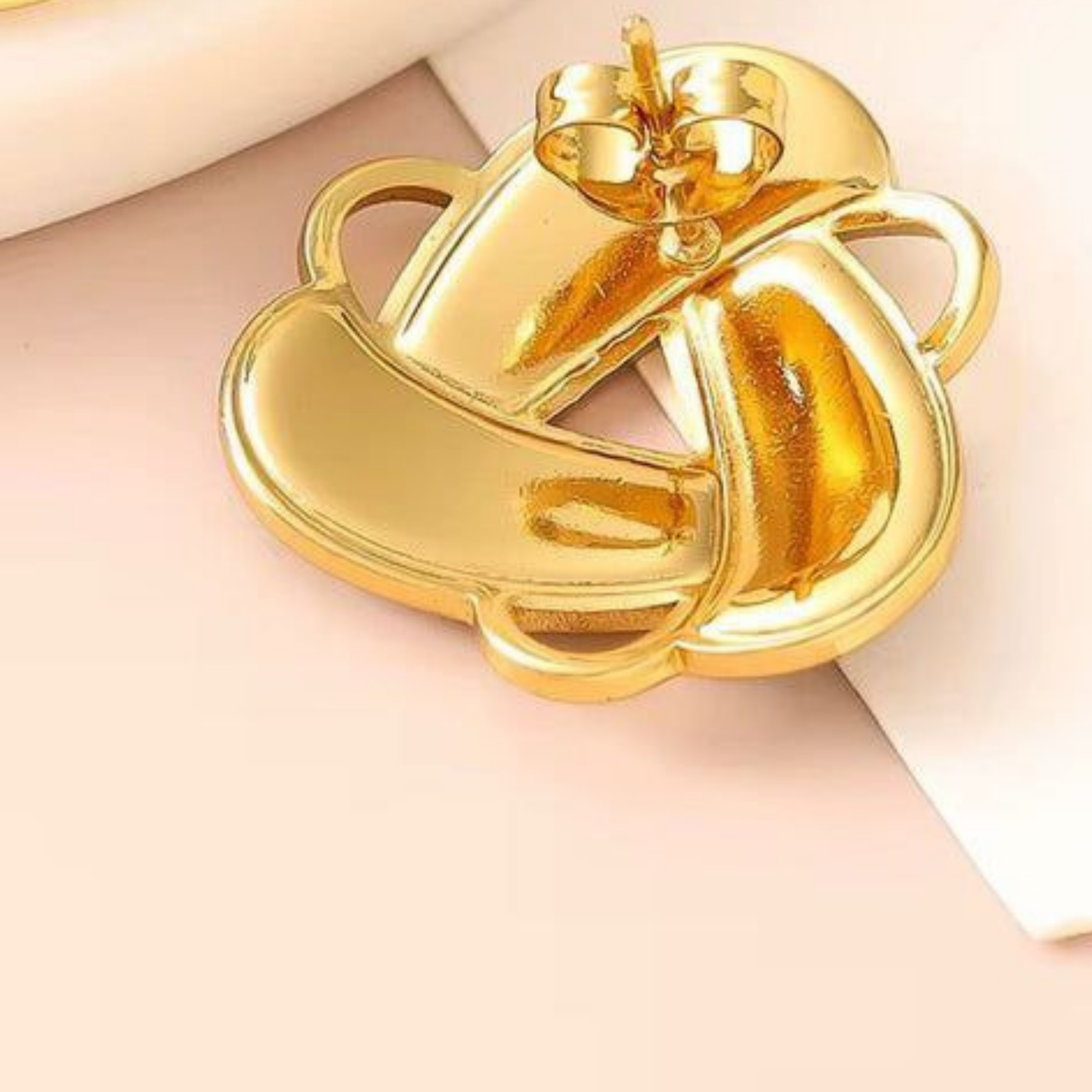 Elan Knot Gold Stud Earrings – Zariva