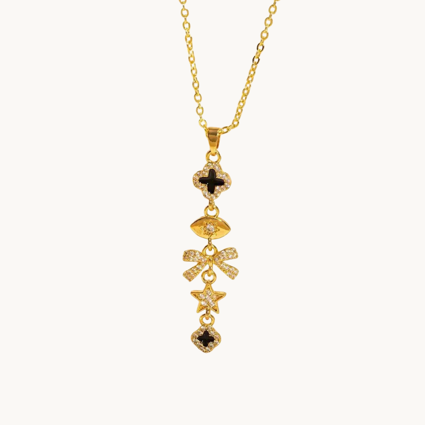 Celestia Noir Charm Necklace featuring a delicate gold chain, black enamel accents and sparkling CZ charm details by ZARIVA.