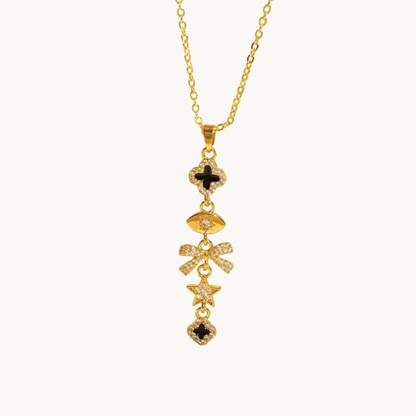 Celestia Noir Charm Necklace featuring a delicate gold chain, black enamel accents and sparkling CZ charm details by ZARIVA.