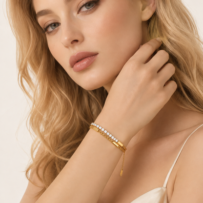 Double-row tennis bracelet worn by a woman, highlighting the elegant gold-tone design and crystal detailing by ZARIVA.