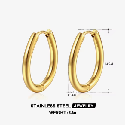 Gold oval hoop earrings in stainless steel, shown with 1.8 cm height, 0.2 cm tube width and 3.4 g weight by ZARIVA.