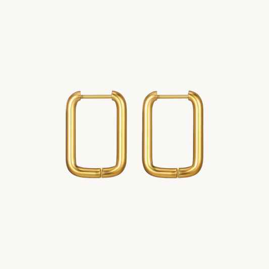 Gold rectangle hoop earrings featuring a smooth elongated geometric silhouette and polished finish for contemporary everyday styling by ZARIVA.