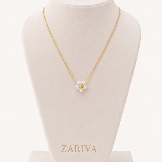 Pearl Blossom Pendant Necklace with a delicate gold-tone chain and floral pearl cluster pendant, presented by ZARIVA.