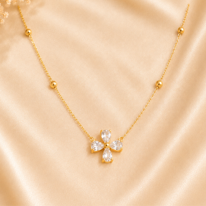 Zariva Clover Beaded Necklace in 18K Gold PVD plated SS316L stainless steel featuring a sparkling four-leaf crystal clover pendant with elegant beaded chain. Anti-tarnish, water-resistant, hypoallergenic everyday luxury jewellery for women.