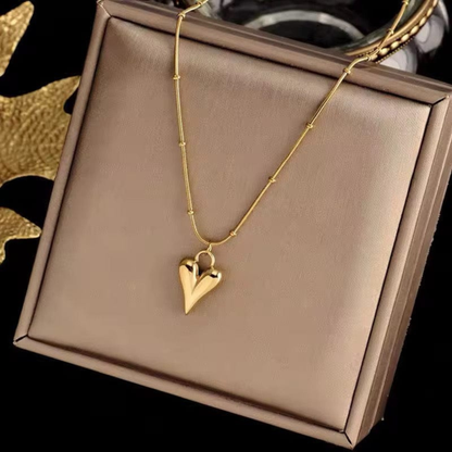Zariva Luminous Heart Pendant Necklace in 18K Gold PVD plated SS316L stainless steel with a minimalist open heart design. Anti-tarnish, water-resistant, hypoallergenic everyday luxury jewellery for women.