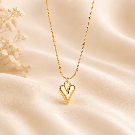 Zariva Luminous Heart Pendant Necklace in 18K Gold PVD plated SS316L stainless steel with a minimalist open heart design. Anti-tarnish, water-resistant, hypoallergenic everyday luxury jewellery for women.