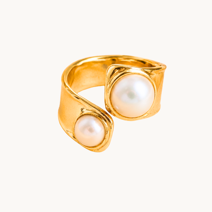 Zariva Pearl Embrace Open Ring in 18K Gold PVD plated SS316L stainless steel featuring an elegant open-band design with dual lustrous pearl accents. Anti-tarnish, water-resistant, hypoallergenic adjustable everyday luxury ring for women.