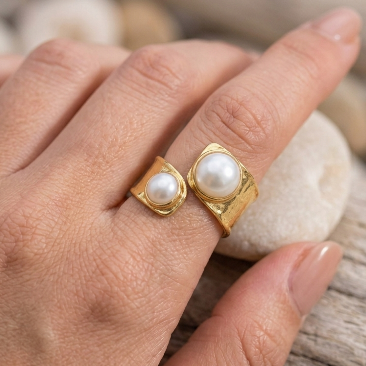 Zariva Pearl Embrace Open Ring in 18K Gold PVD plated SS316L stainless steel featuring an elegant open-band design with dual lustrous pearl accents. Anti-tarnish, water-resistant, hypoallergenic adjustable everyday luxury ring for women.