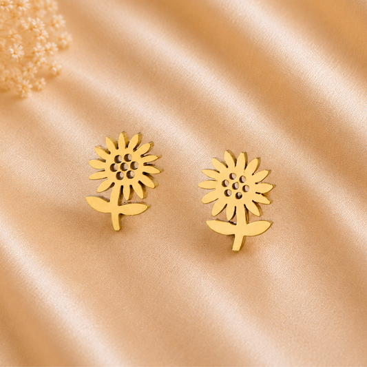 ZARIVA Soleia Bloom Mini Floral Stud Earrings for women crafted from premium SS316L stainless steel with 18K PVD gold plating. Anti-tarnish, waterproof, lightweight sunflower-inspired stud earrings under 1 cm for everyday wear.
